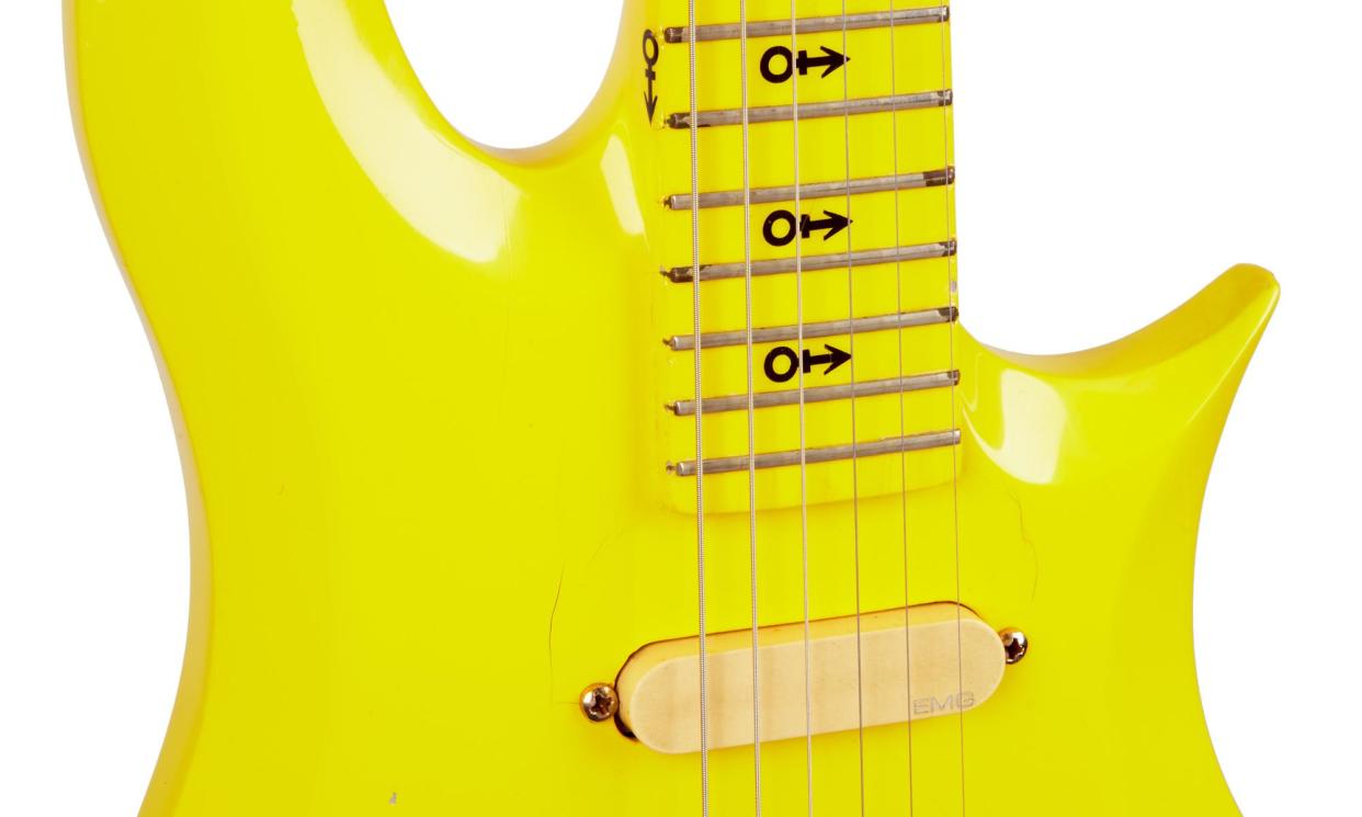 <span>The yellow Cloud 3 was last sold nearly 20 years ago for £4,200, when it had not been verified as one of the originals played by Prince.</span><span>Photograph: Julien's Auctions</span>