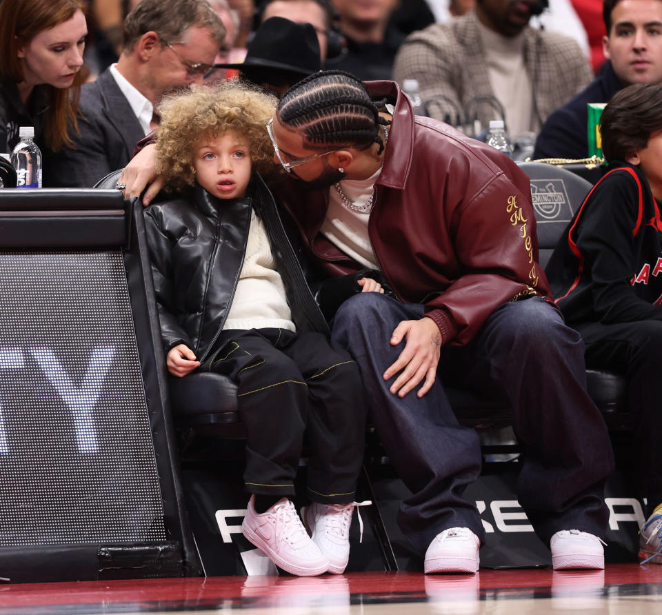 Drake checks in on his son, Adonis Graham. (Richard Lautens / Toronto Star via Getty Images)