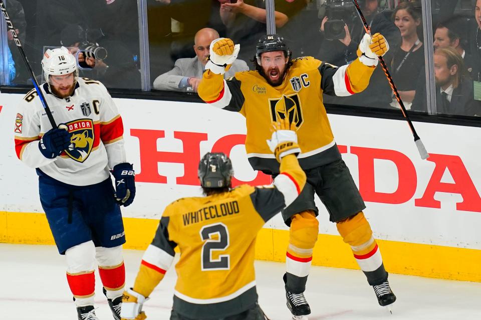 Game 5: Vegas Golden Knights forward Mark Stone (61) celebrates his goal with defenseman Zach Whitecloud (2).