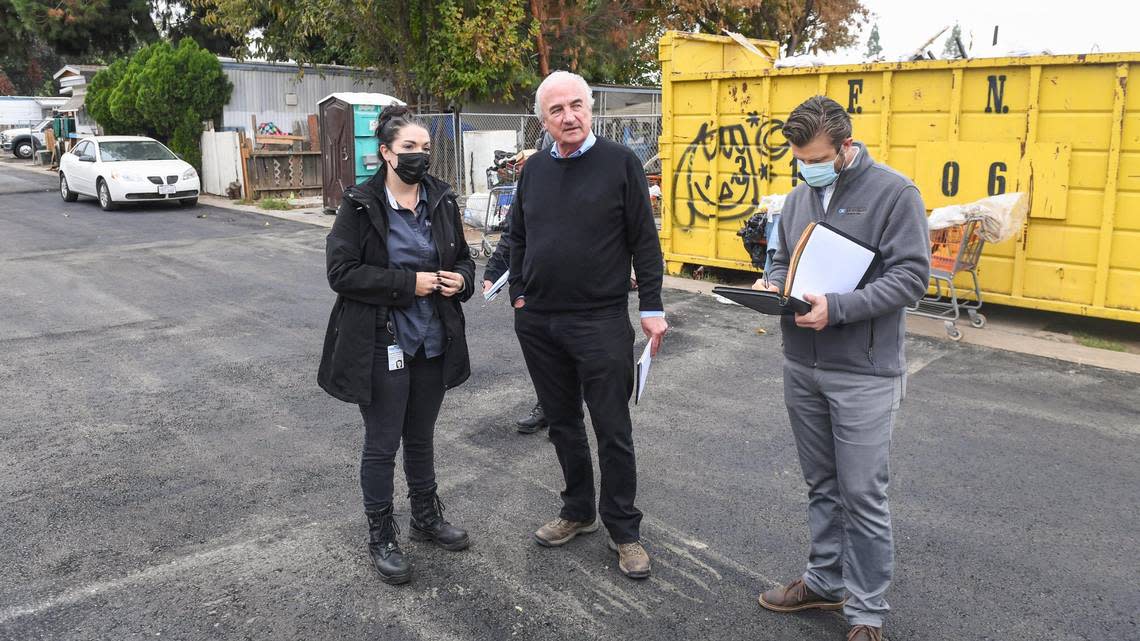 Mark Adams, president of California receivership group tours the Trails End Mobile Home Park in Fresno with members of his team and Fresno code enforcement on Tuesday, Nov. 16, 2021. Fresno County Superior Court has appointed the receiver to remediate the troubled park and bring it under code compliance.