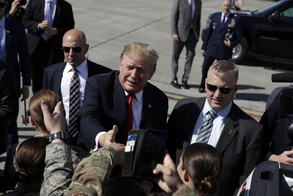 President Donald Trump greets troops after landing at Joint Base Elmendorf-Richardson for a refueling stop en route to Japan Friday, May 24, 2019, in Anchorage. (AP Photo/Evan Vucci)