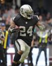 FILE PHOTO: Nov 19, 2017; Mexico City, MEX; Oakland Raiders running back Marshawn Lynch (24) carries the ball against the New England Patriots during an NFL International Series game at Estadio Azteca. The Patriots defeated the Raiders 33-8. Kirby Lee-USA TODAY Sports