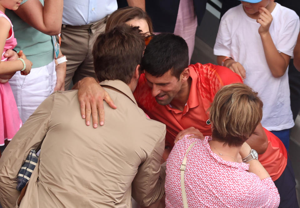 PARIS, FRANCE - JUNE 11: Novak Djokovic of Serbia celebrates with Tom Brady after his straight sets victory against Casper Ruud of Norway in the Men's Singles Final match on Day Fifteen of the 2023 French Open at Roland Garros on June 11, 2023 in Paris, France.. (Photo by Clive Brunskill/Getty Images)