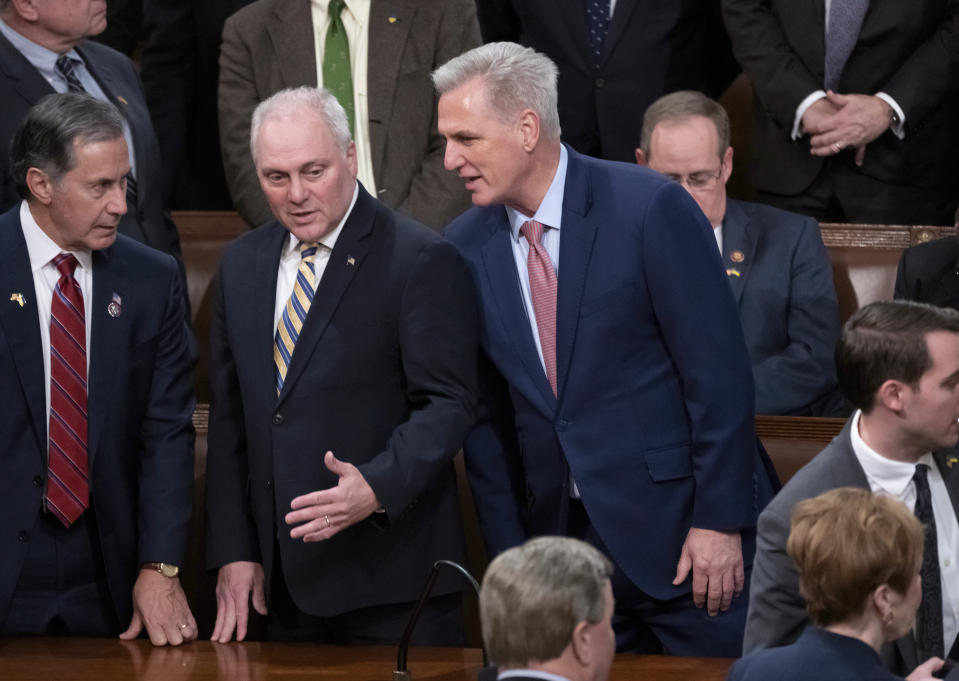 FILE - House Republican Leader Kevin McCarthy, R-Calif., confers with Minority Whip Steve Scalise, R-La., left, before an address by Ukrainian President Volodymyr Zelenskyy in the House chamber, at the Capitol in Washington, Wednesday, Dec. 21, 2022. The new 118th Congress, with Republicans in control of the House, begins Jan. 3, 2023, but the first task for the GOP is electing a new speaker and whether House Republican Leader Kevin McCarthy, R-Calif., can overcome opposition from conservatives in his own ranks to get the job. (AP Photo/J. Scott Applewhite, File)