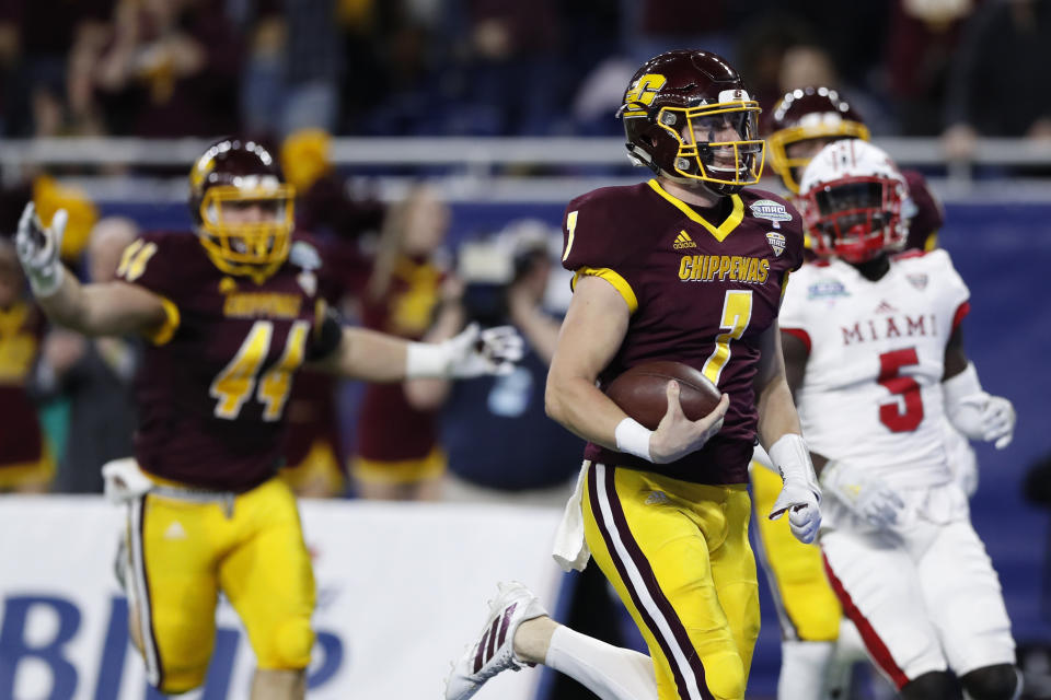 Central Michigan quarterback Tommy Lazzaro (7) runs for a touchdown during the first half of the Mid-American Conference championship NCAA college football game against Miami of Ohio, Saturday, Dec. 7, 2019, in Detroit. (AP Photo/Carlos Osorio)