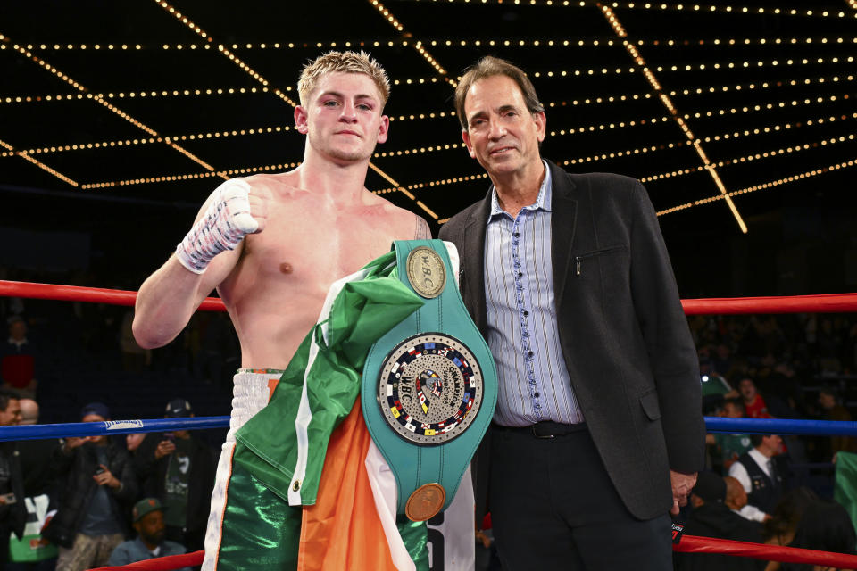 Callum Walsh (L) won a unanimous decision over Ismael Villarreal on Thursday at Madison Square Garden. He posed after the fight with promoter Tom Loeffler. (Lina Baker/360 Promotions)