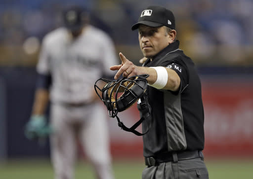 Umpires will be wearing white wristbands during all games to protest the escalating verbal attacks by the players. (AP)