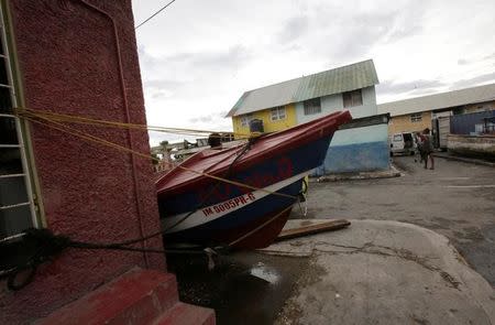 A boat is secured at Port Royal as Hurricane Matthew approaches, in Kingston, Jamaica October 2, 2016. REUTERS/Henry Romero