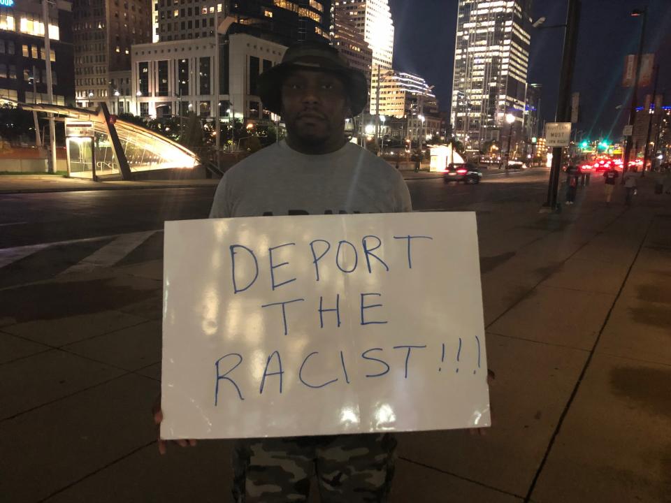 A 38-year-old protester named Brandon holds a sign near U.S. Bank Arena after a Trump rally in Cincinnati on Aug. 1, 2019. (Photo: Christopher Mathias / HuffPost )