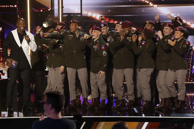 <p>Trae Patton/NBC via Getty </p> Judge Terry Crews and the 82nd Airborne Division All-American Chorus on "America's Got Talent."