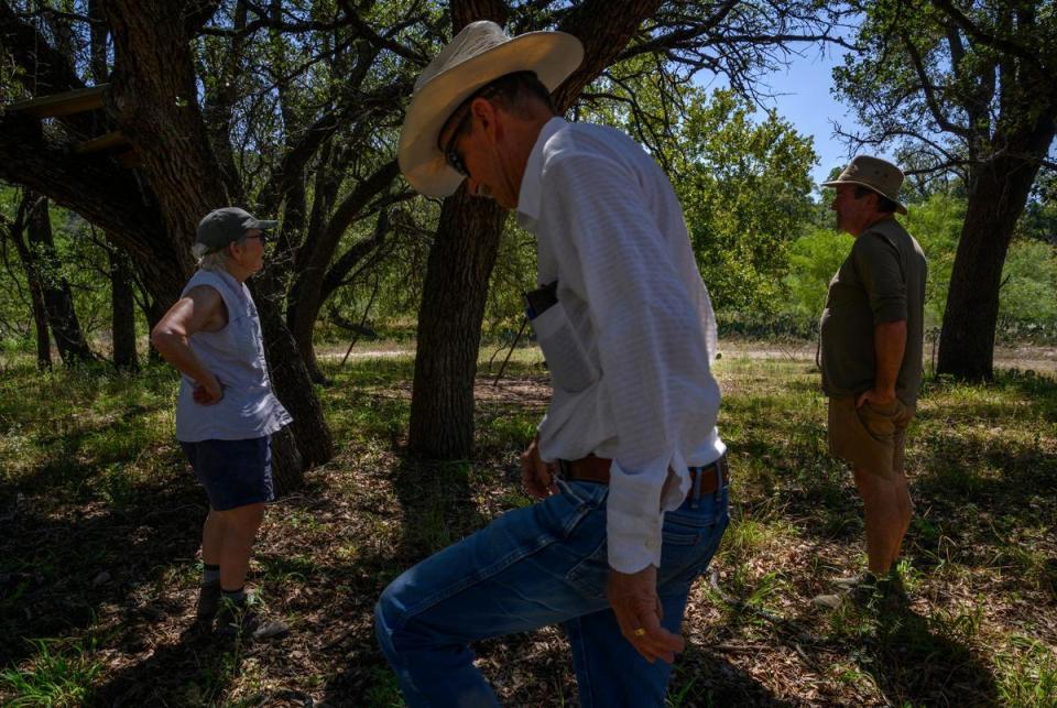 From left, Linda Fawcett, Art Mudge and Glen Coleman walk a portion of Fawcett’s property that was used as a hunting ground during her childhood Wednesday, Sept. 20, 2023, in Junction.