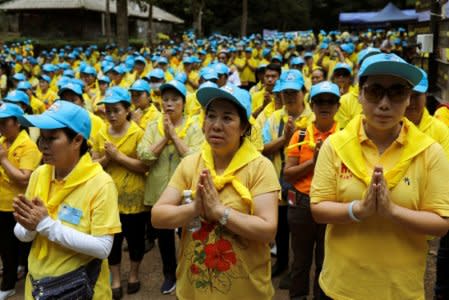 Mourners attend the funeral of former Thai navy diver, Samarn Kunan, who died during the rescue mission for the 12 boys of the