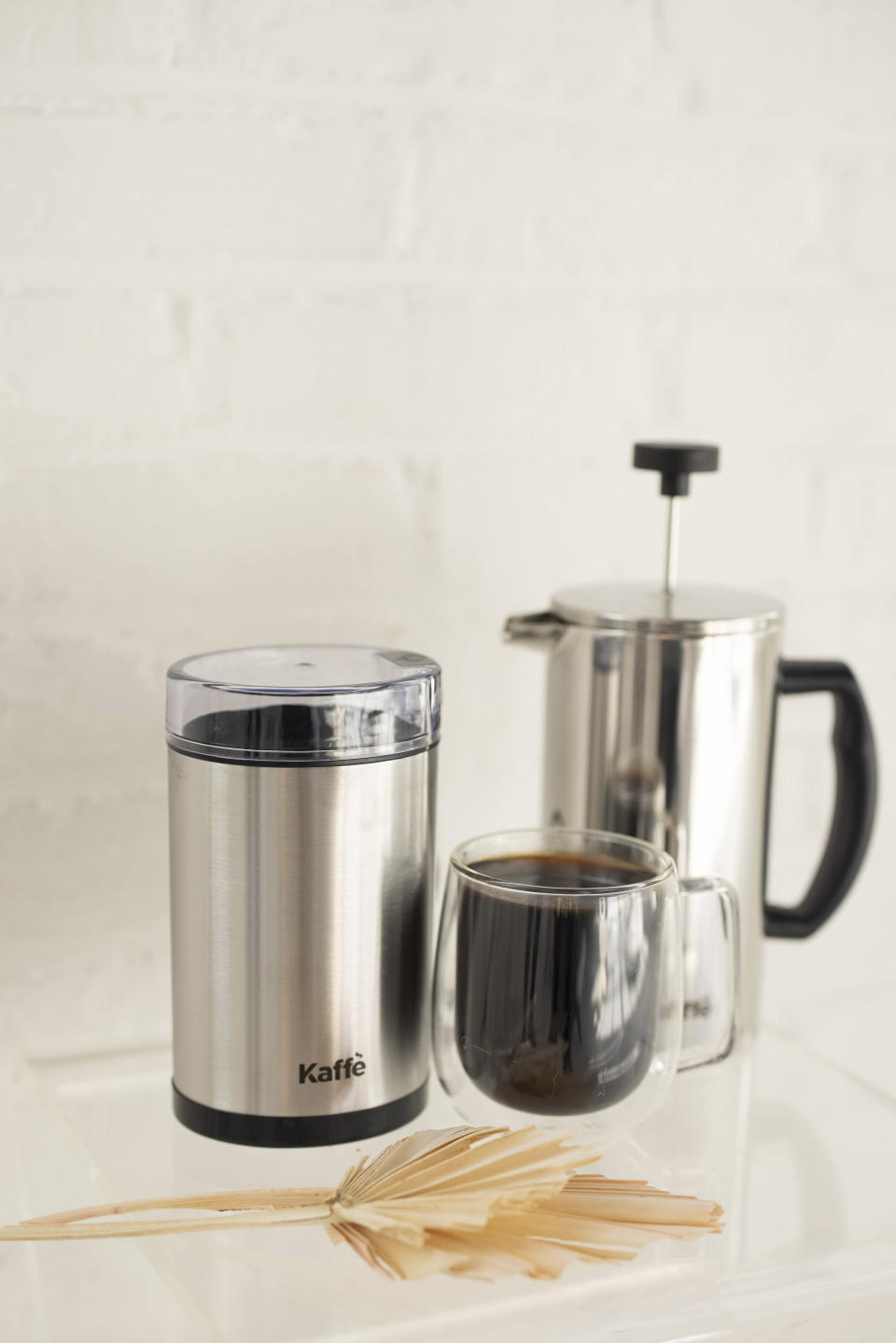 This photo supplied by Kaffe shows some of the basics of home coffee making: a grinder, French press and simple mug. Instant is in, fancy is out. Nothing stays the same for long in the world of home-brewed coffee. (Kaffe via AP)