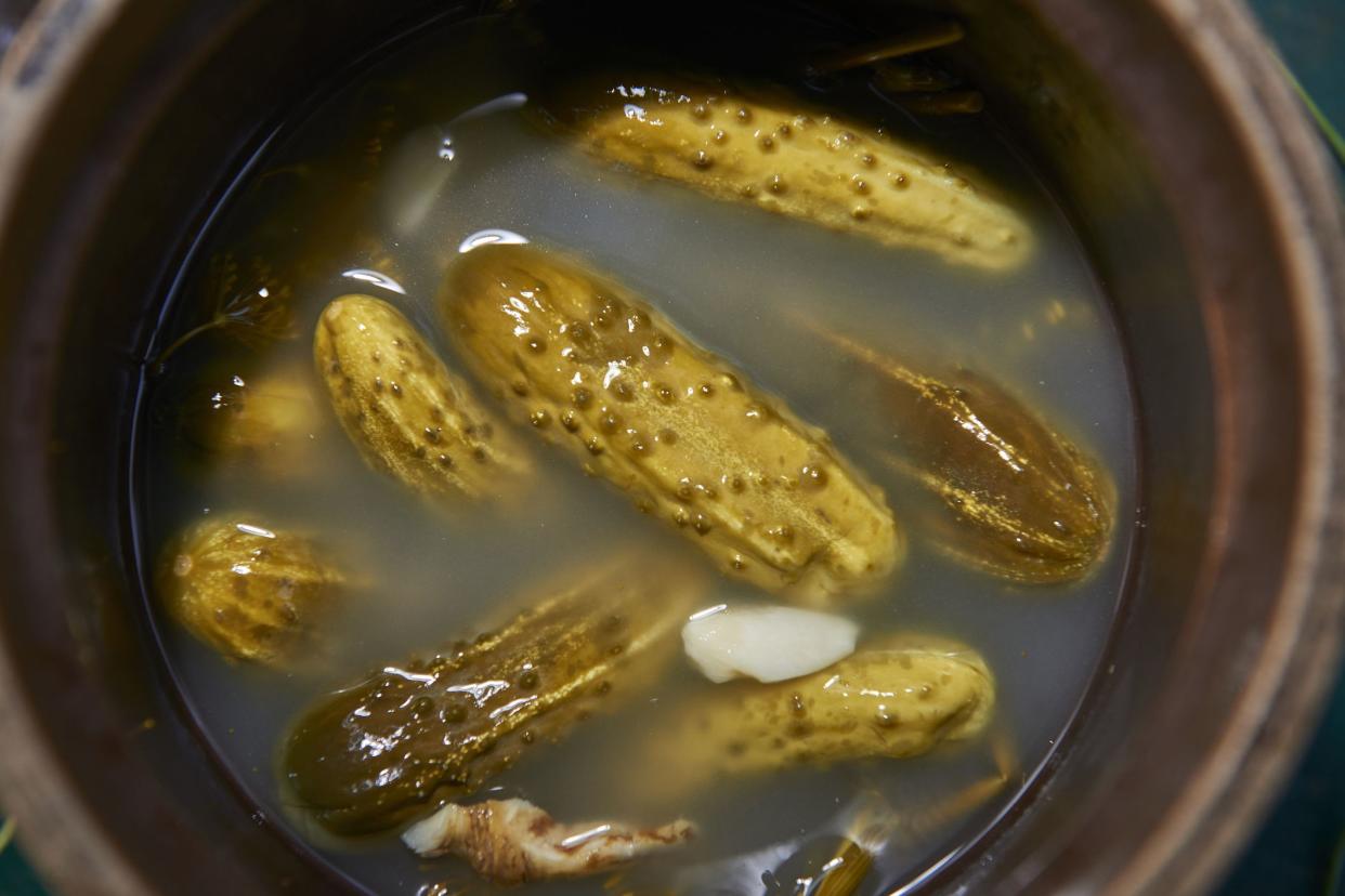 pickles in jar of brine