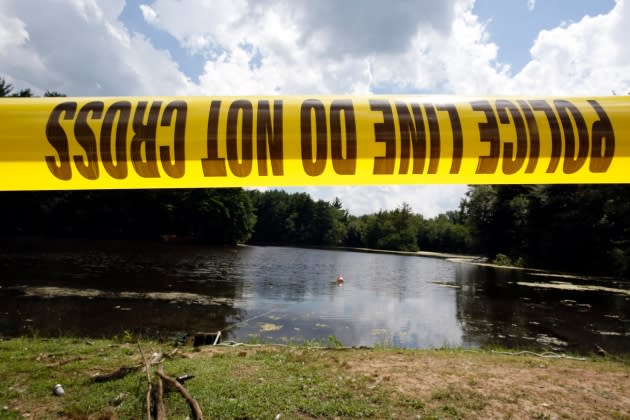 3-girls-homicide-pond.jpg Police Search Pine Lake - Credit: Jessica Rinaldi/Boston Globe/Getty Images