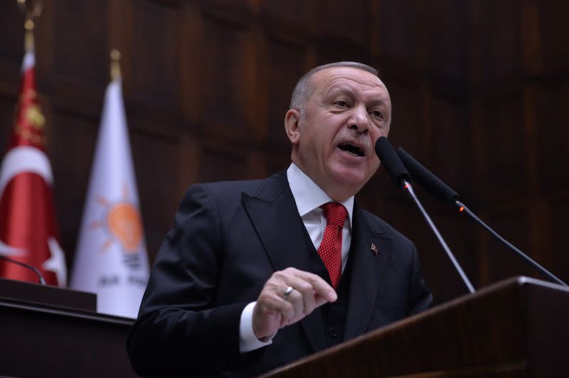 Turkish President Erdogan addresses members of his ruling AK Party at the parliament in Ankara