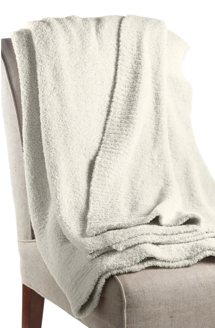 Draped over the back of the couch, a chair, or strewn across the bed, the CozyChic Throw fits in everywhere.