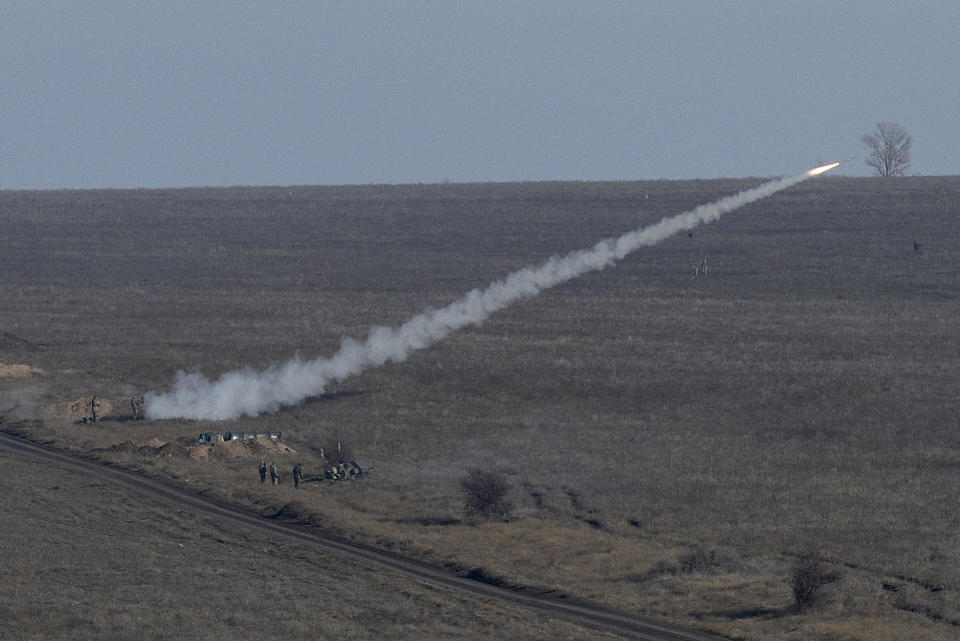 Ukrainian soldiers launch an anti-aircraft rocket during military exercises near Urzuf, south coast of Azov sea, eastern Ukraine, Thursday, Nov. 29, 2018. Ukraine put its military forces on high combat alert and announced martial law this week after Russian border guards fired on and seized three Ukrainian ships in the Black Sea. (AP Photo/Evgeniy Maloletka)