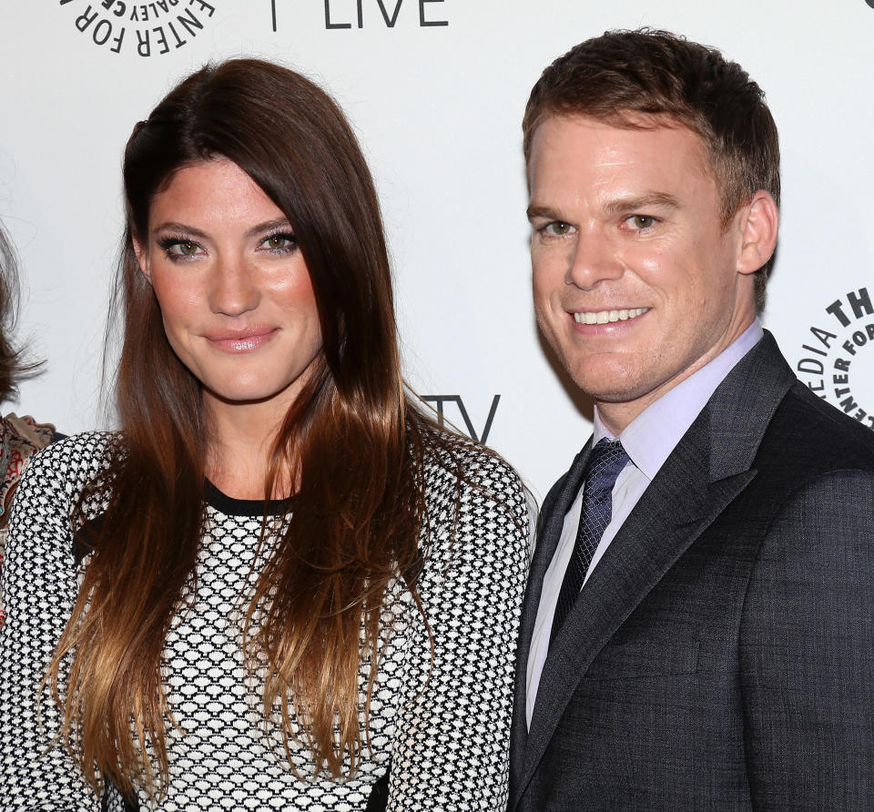 Michael C. Hall smiling with Jennifer Carpenter on the red carpet