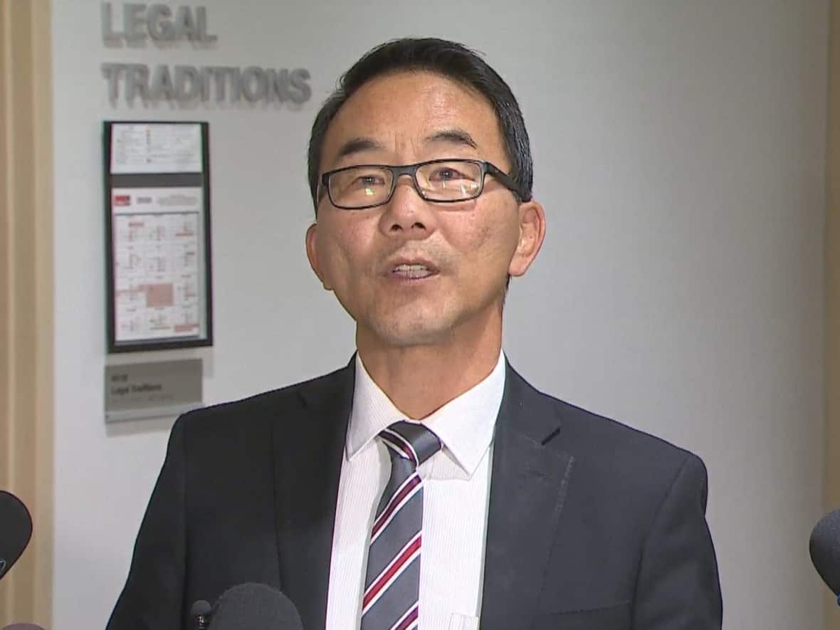 Coun. Sean Chu spoke to media Thursday. He said he won't be stepping down following following calls for his resignation from city council colleagues.  (Rebecca Kelly/CBC - image credit)