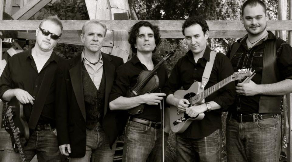 Formerly Wilmington-based actor, singer and guitarist Larry Tobias (second from left) fronts The Grand Tour, a band paying tribute to the songs of country legend George Jones.