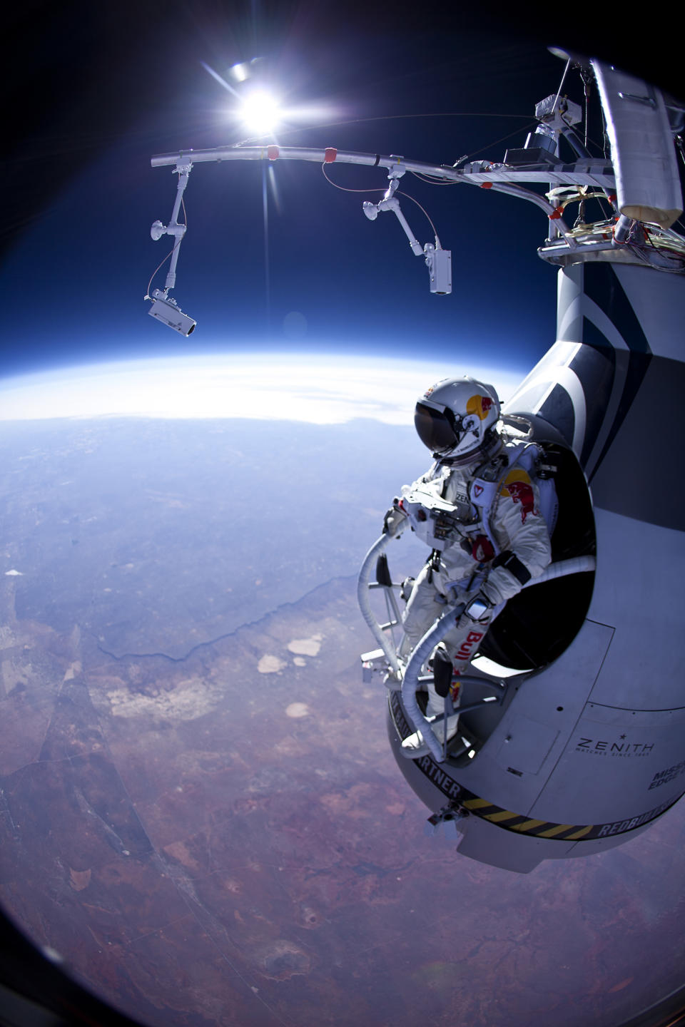 FILE - In this Thursday, March 15, 2012 photo provided by Red Bull Stratos, Felix Baumgartner prepares to jump during the first manned test flight for Red Bull Stratos over Roswell, N.M. Some 52 million watched YouTube's live stream of daredevil Baumgartner's free-fall jump from space, a viewership that far outpaced the 7.6 million who watched it on the Discovery Channel in the U.S. (AP Photo/Red Bull Stratos, Jay Nemeth)