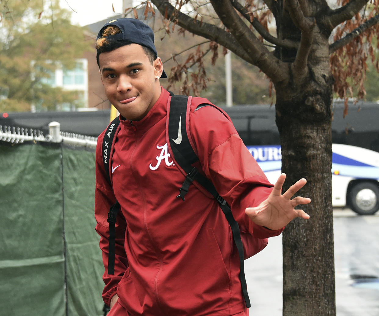 Alabama freshman quarterback Tua Tagovailoa waves to fans Tuesday, Jan. 9, 2018, as the team returned to Tuscaloosa, Ala. Alabama defeated Georgia in 26-23 in overtime in Monday night’s NCAA college football championship game. (Joe Songer/AL.com via AP)