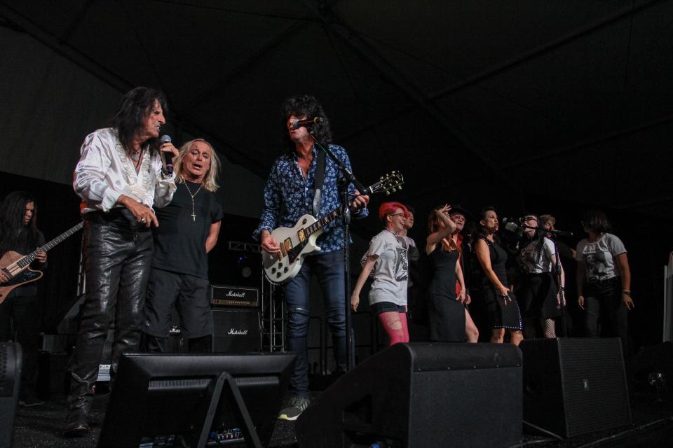 Alice Cooper, Tommy Thayer of Kiss and Robin Zander of Cheap Trick perform at Alice Cooper's Rock & Roll Fundraising Bash at the Las Sendas Golf Club in Mesa on April 27, 2019.