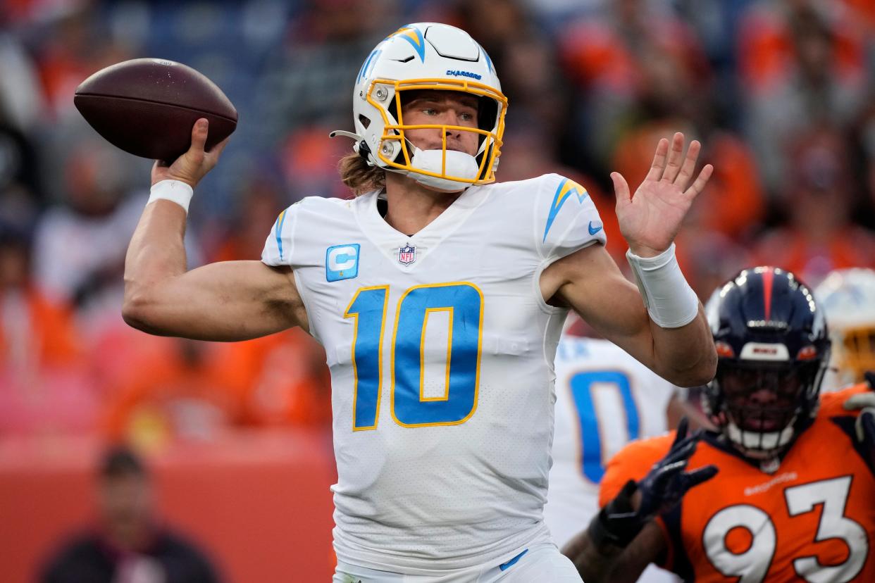 Los Angeles Chargers quarterback Justin Herbert (10) had 303 passing yards and threw two touchdown passes on Sunday, but the Chargers lost 28-13 at Denver.