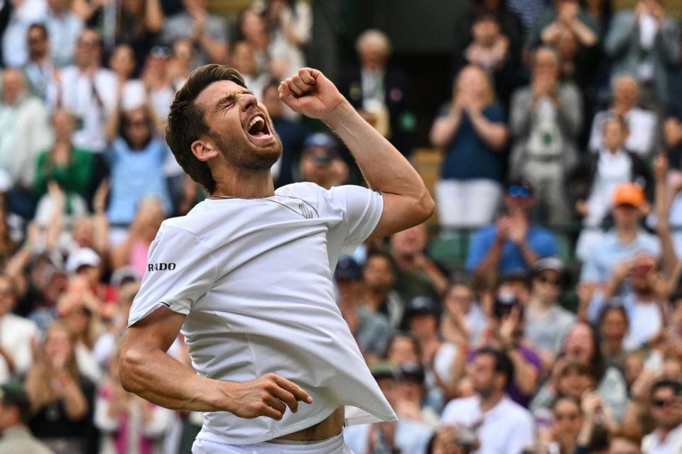 Britain's Cameron Norrie celebrates winning against US player Tommy Paul during their round of 16 men's singles tennis match on the seventh day of the 2022 Wimbledon Championships (AFP via Getty Images)