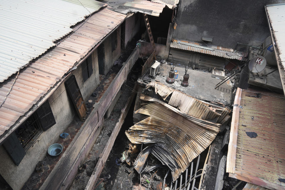 This photo shows the aftermath of a fire at small apartment building in Hanoi, Vietnam Friday, May 24, 2024. State media said the overnight fire has killed a number of people and injured several others. (AP Photo/Hau Dinh)