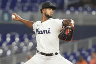 Miami Marlins starting pitcher Roddery Munoz aims a pitch during the second inning of a baseball game against the Colorado Rockies, Wednesday, May 1, 2024, in Miami. (AP Photo/Marta Lavandier)