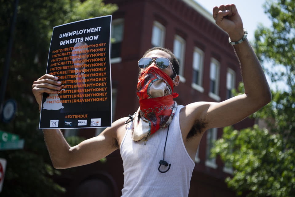 UNITED STATES - JULY 22: Demonstrators rally near the Capitol Hill residence of Senate Majority Leader Mitch McConnell, R-Ky., to call for the extension of unemployment benefits on Wednesday, July 22, 2020. The benefit, created by the CARES Act, is set to expire on July 31. (Photo By Tom Williams/CQ-Roll Call, Inc via Getty Images)