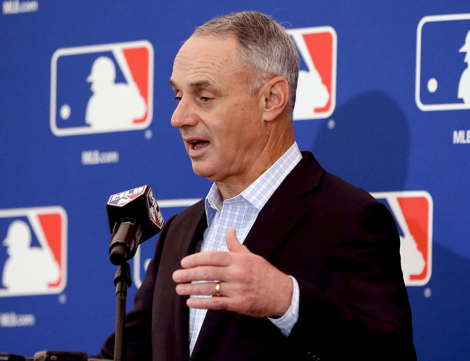 Rob Manfred says he didn’t know Derek Jeter’s ownership group would dismantle the Marlins. (AP Photo/John Raoux)
