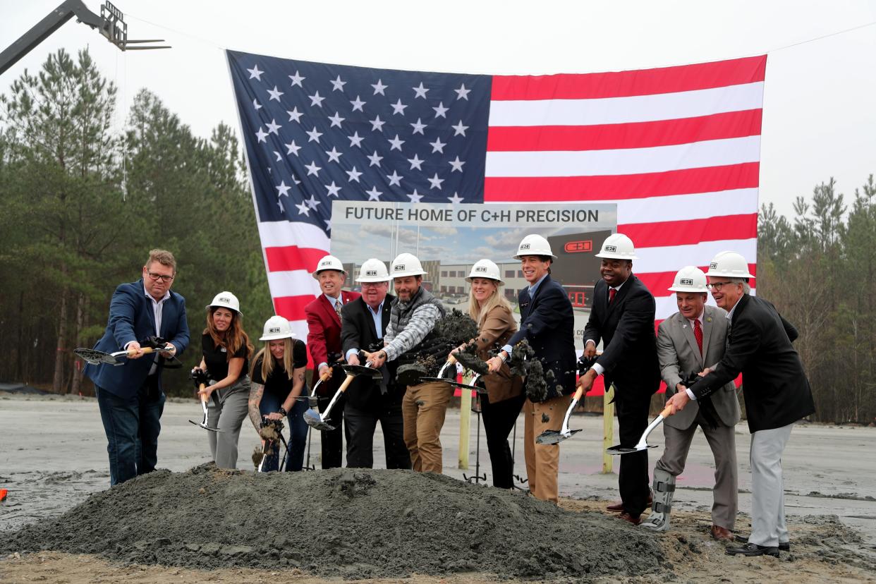 Buck Holly is joined by dignitaries, including Congressman Buddy Carter, TJ Hudson, and Richmond Hill Mayor Russ Carpenter during a ceremonial groundbreaking for the expansion of C&H Precision in Richmond Hill on Monday, March 4, 2024.