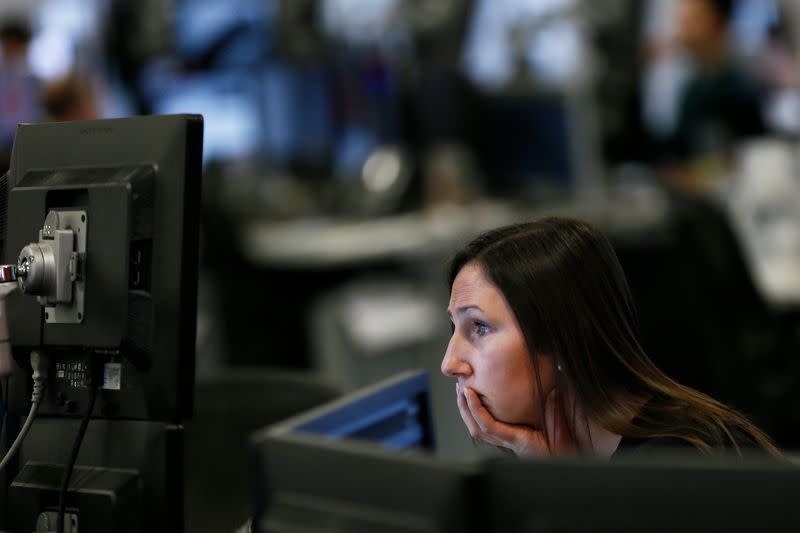 A market maker works on the trading floor at IG Index in London