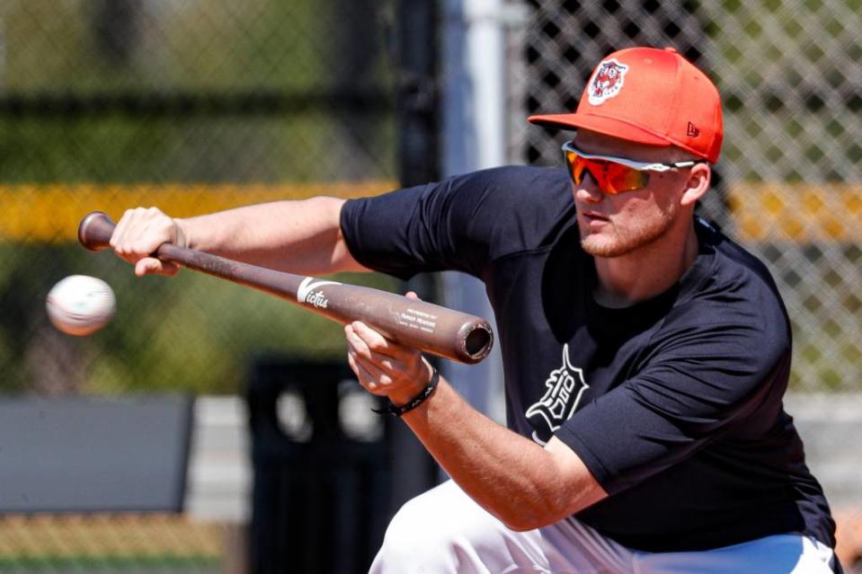 Detroit Tigers outfielder Parker Meadows bunts during spring training at TigerTown. Junfu Han / USA TODAY NETWORK