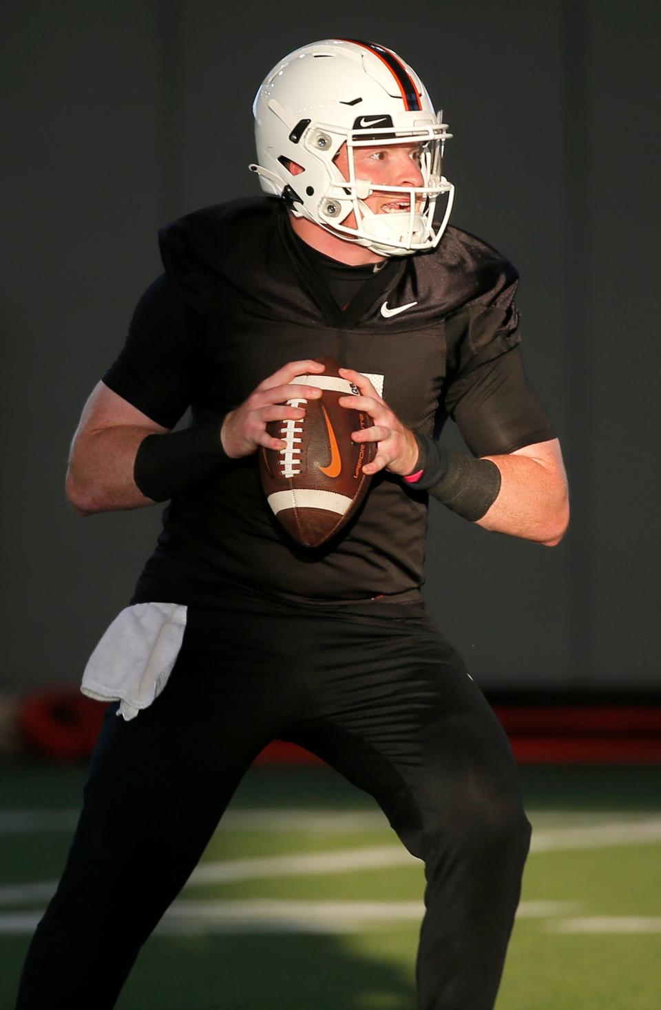 Oklahoma State quarterback Alan Bowman looks to throw a pass during practice on Aug. 2 in Stillwater.