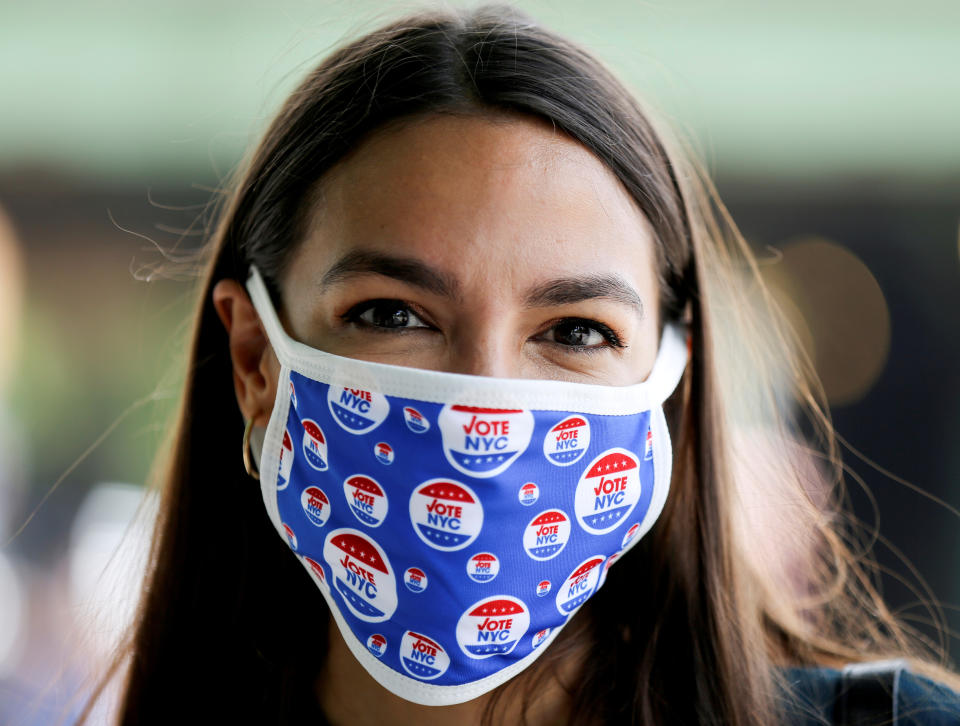 Rep. Alexandria Ocasio-Cortez (D-NY), stands for a portrait after voting early in the Democratic congressional primary election June 20, 2020. REUTERS/Caitlin Ochs/File Photo