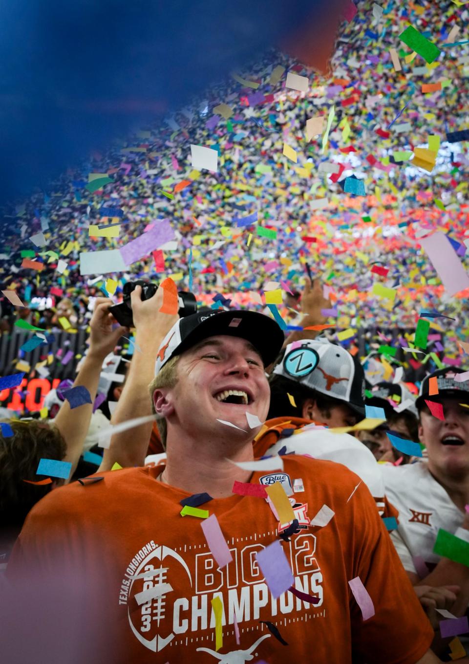 Texas linebacker Marshall Landwehr celebrates after winning the Big 12 Conference Championship Game 49-21 over Oklahoma State at AT&T Stadium in Arlington, Texas, Saturday, Dec. 2, 2023