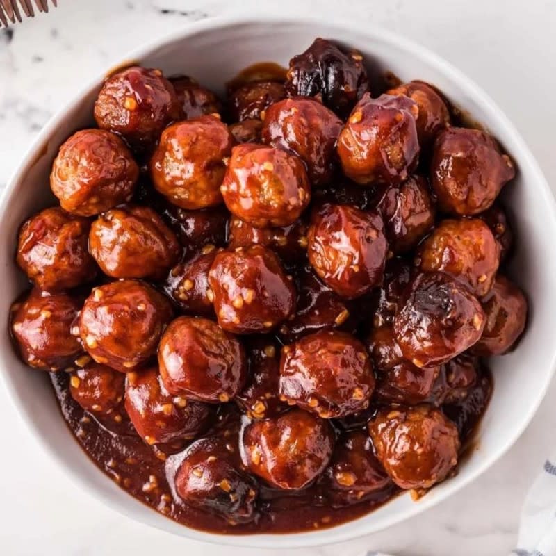 <p>The Chunky Chef</p><p>These meatballs are smothered in a flavorful honey garlic barbecue sauce.</p><p><strong>Get the recipe: <a href="https://www.thechunkychef.com/honey-garlic-crockpot-meatballs/" rel="nofollow noopener" target="_blank" data-ylk="slk:Honey Garlic Crock Pot Meatballs;elm:context_link;itc:0;sec:content-canvas" class="link rapid-noclick-resp">Honey Garlic Crock Pot Meatballs</a></strong></p><p><strong>Related: 45 <a href="https://parade.com/844585/felicialim/18-comforting-filling-dinners-for-cold-nights/" rel="nofollow noopener" target="_blank" data-ylk="slk:Comfort Food Recipes;elm:context_link;itc:0;sec:content-canvas" class="link rapid-noclick-resp">Comfort Food Recipes</a></strong></p>