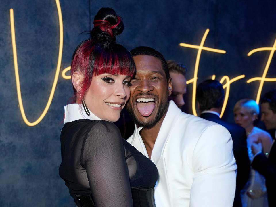 Jennifer Goicoechea and Usher attend the 2023 Vanity Fair Oscar Party.