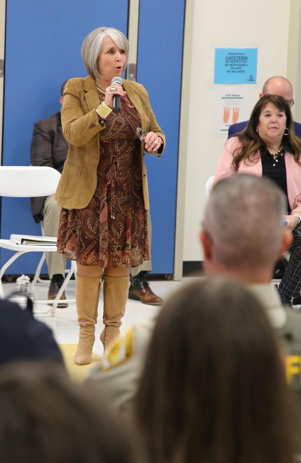 Gov. Michelle Lujan Grisham addresses the crowd at a town hall meeting on Thursday, April 11 at Animas Elementary School in Farmington.