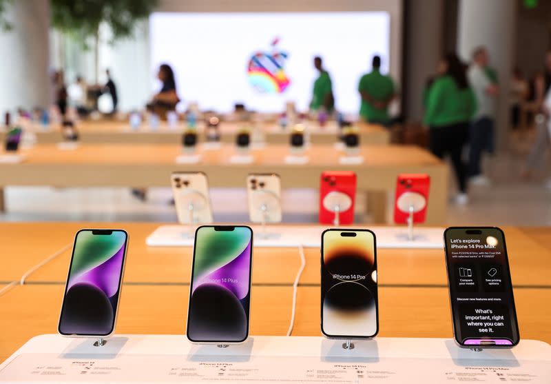 Apple iPhones are seen inside India's first Apple retail store, a day ahead of its launch, in Mumbai