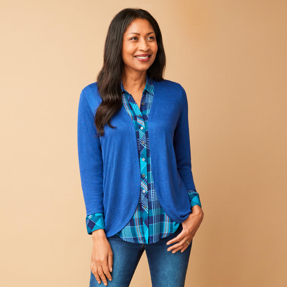 model wearing blue jeans, blue checkered top and blue Lightweight Knit Cardigan (Photo via Northern Reflections)