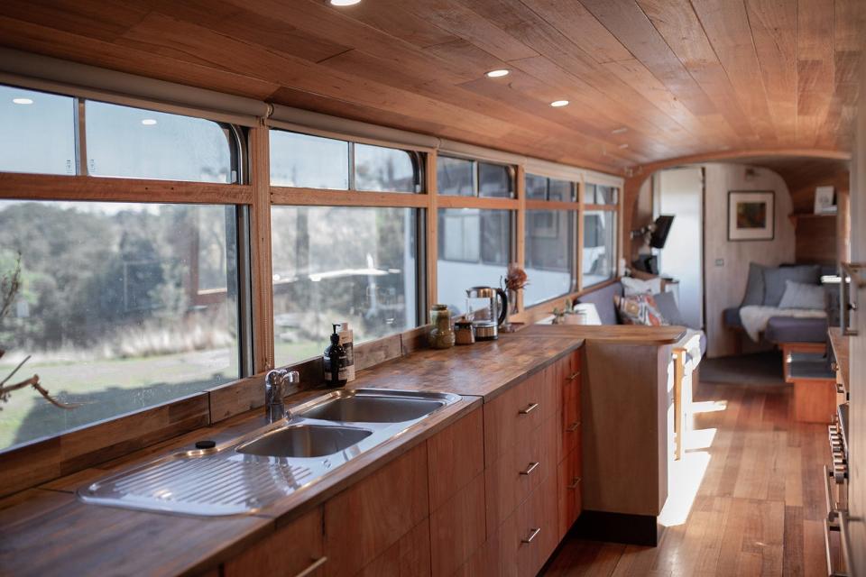 The kitchen view in The Bus Hideaway, a bendy bus rented out on Airbnb.