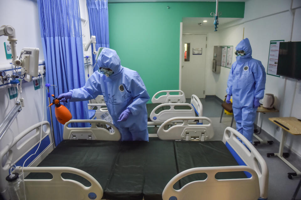 BEIJING, April 28, 2020 .Medical staff of Xiaotangshan Hospital disinfect a ward after the hospital cleared all COVID-19 cases in Beijing, capital of China, April 28, 2020.   Xiaotangshan Hospital, which was previously used to quarantine SARS patients in Beijing, cleared all COVID-19 cases Tuesday and is scheduled to cease operation Wednesday.    The hospital, located in the city's northern suburb, was renovated and put into operation on March 16 for the screening and treatment of imported mild and common confirmed COVID-19 cases, suspected cases and those who need to be tested. (Photo by Peng Ziyan/Xinhua via Getty) (Xinhua/Peng Ziyang via Getty Images)