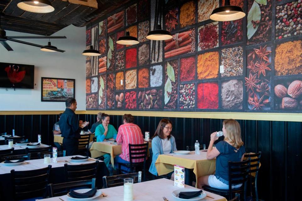 A mural covers an accent wall at the new Indian Delight restaurant on Washington Avenue, north of Ocean Springs. Hannah Ruhoff/Sun Herald