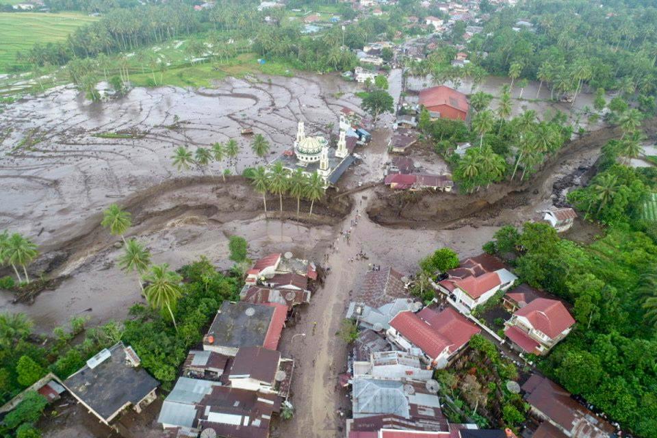 Flash flood kills at least 43 people in West Sumatra (EPA)