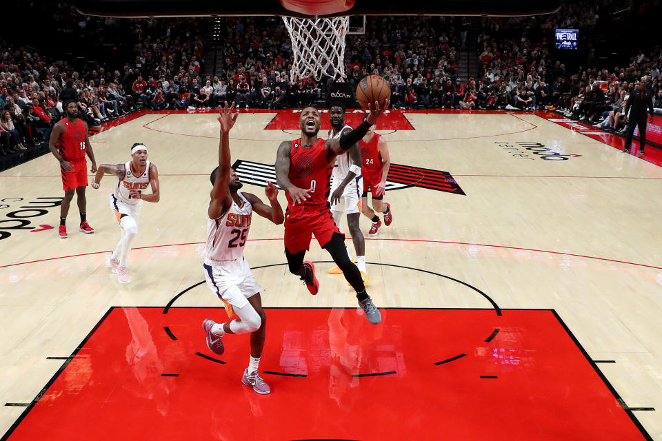 PORTLAND, OREGON - OCTOBER 21: Damian Lillard #0 of the Portland Trail Blazers shoots against the Phoenix Suns during the second quarter at Moda Center on October 21, 2022 in Portland, Oregon. NOTE TO USER: User expressly acknowledges and agrees that, by downloading and or using this photograph, User is consenting to the terms and conditions of the Getty Images License Agreement. (Photo by Steph Chambers/Getty Images)